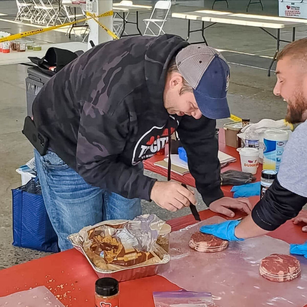 Volunteer making food
