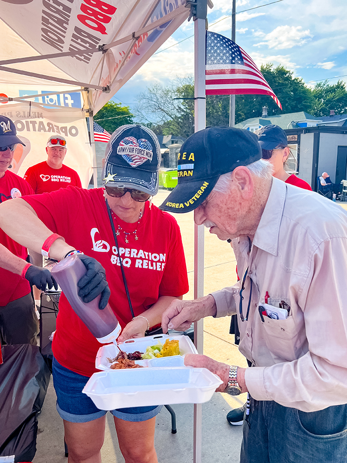 Volunteer helping veteran